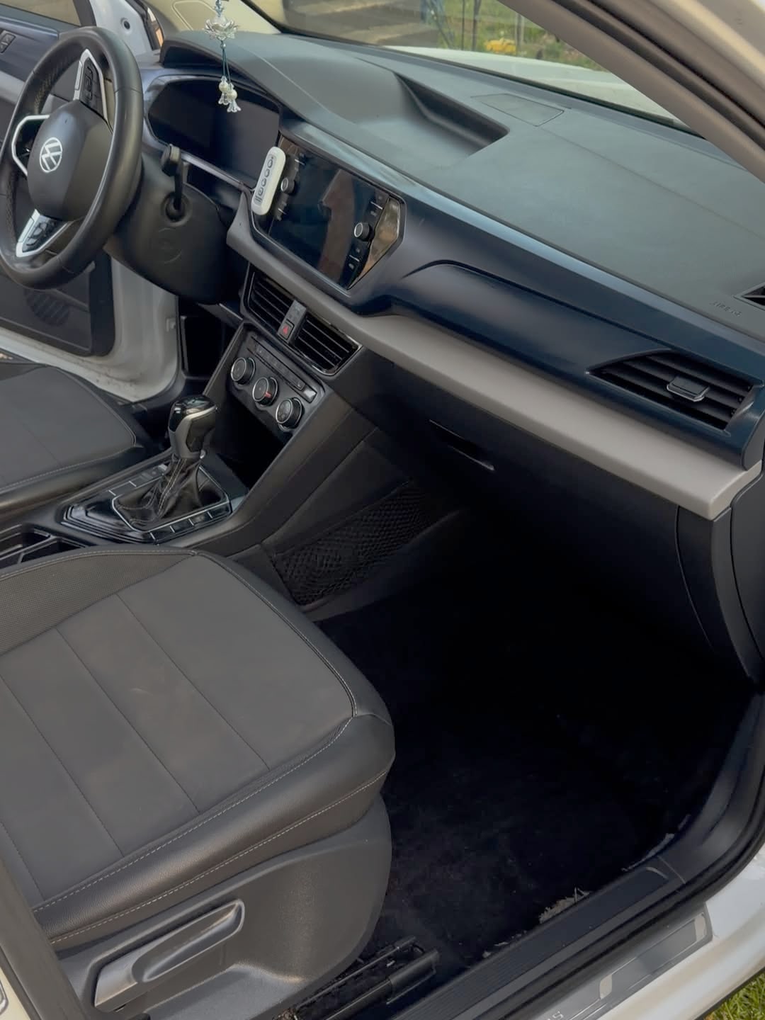 After detailing by MaddStripez Detailing — Front floor & cabin — muddy carpets brought back to new