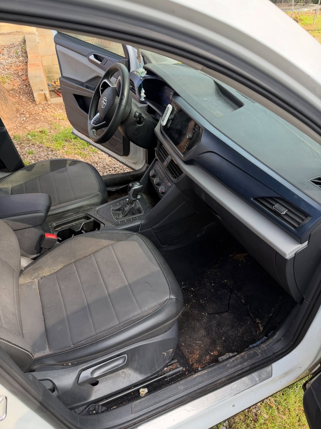 Before detailing by MaddStripez Detailing — Front floor & cabin — muddy carpets brought back to new